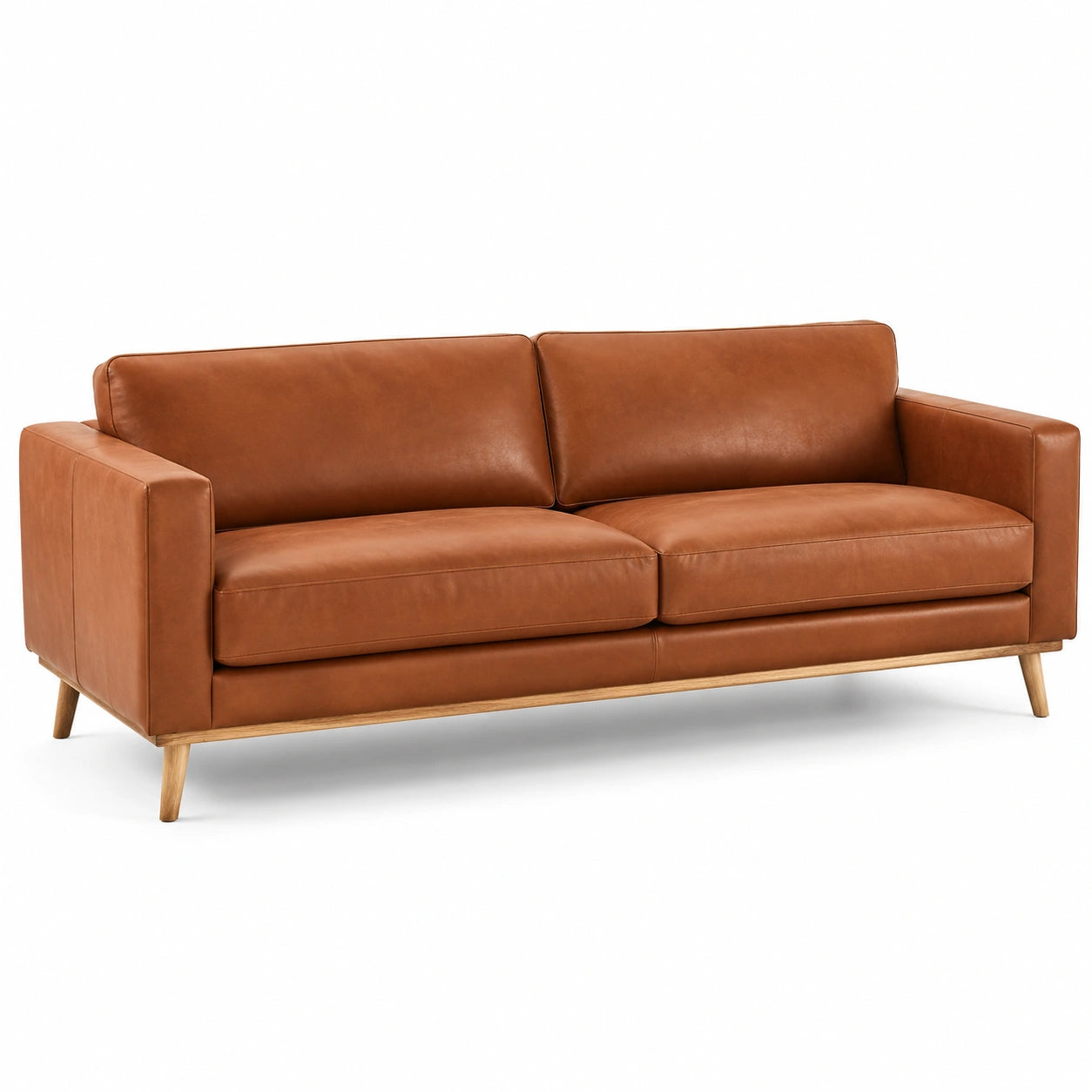 Divano in pelle con gambe in legno massello